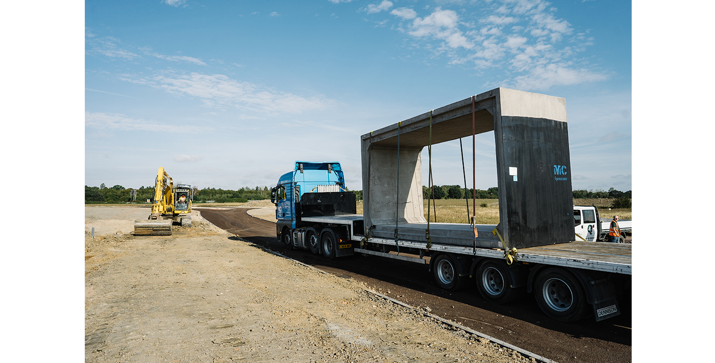 FP-McCann-lorry-delivering-large-Box-Culvert-section-to-The-Wixams-Village-3-site-in-Bedfordshire