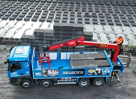 HIAB lorry loading concrete building blocks at FP McCann's Clarke's Quarry in Lisnaskea, County Fermanagh
