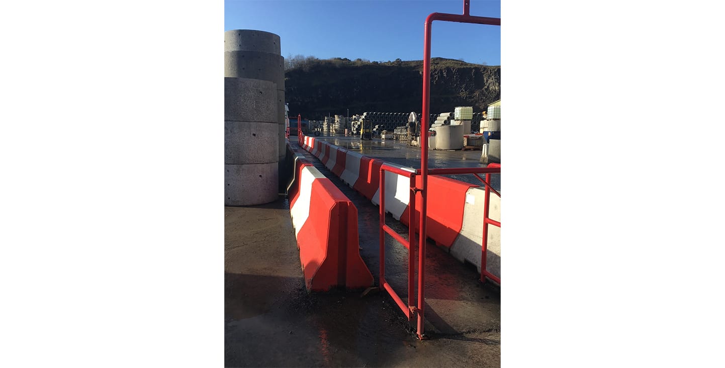 Precast concrete safety barriers set up for pedestrian walkway segregation