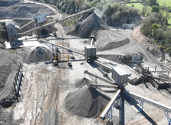 loughside-quarry-larne-aggregates-county-antrim-fp-mccann FP McCann Loughside Quarry in Larne, showing aggregate stockpiles