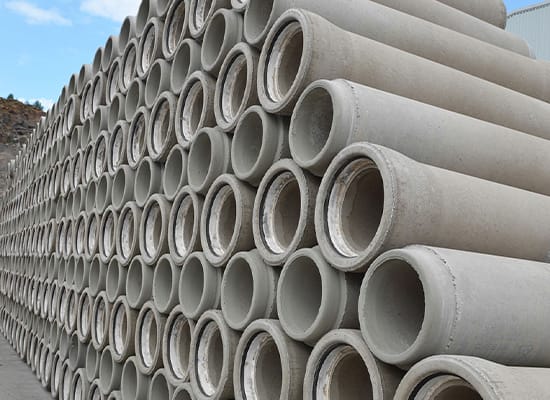 High-quality precast concrete drainage pipes manufactured at Knockloughrim, ready for dispatch.