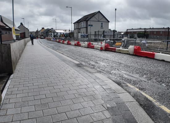 Railway-street-towards-Strabane-retail-park-fp-mccann-LR Public realm works progressing along Railway Street with new paving and kerbing installed