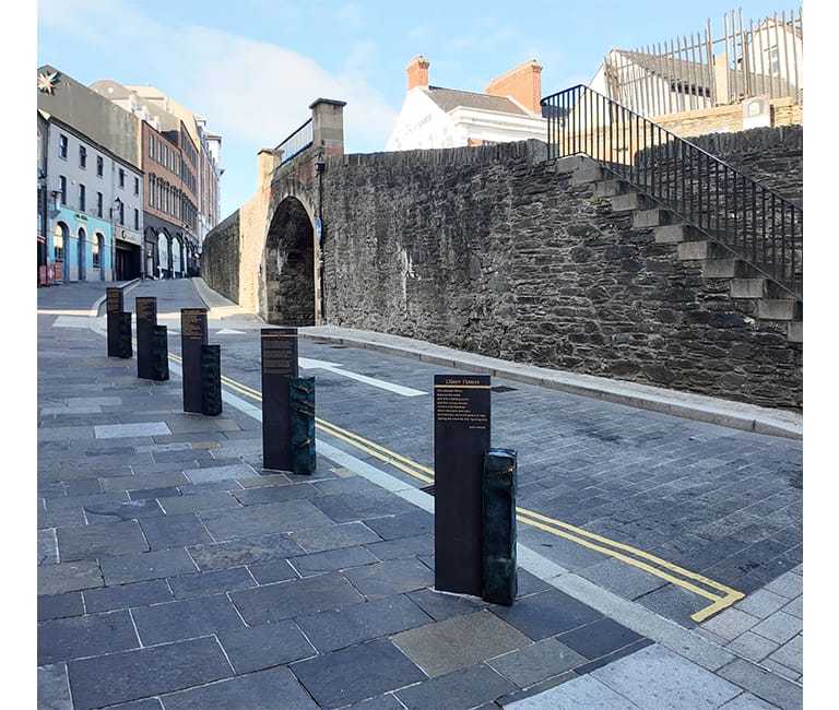 FP McCann's Inner Walled City project featuring natural stone paving and heritage streetscape improvements.